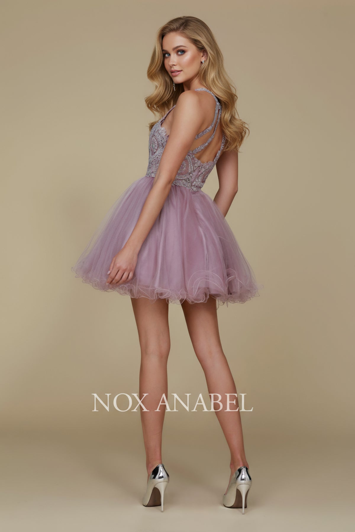 Fabulous cocktail dress featuring a flattering halter... –